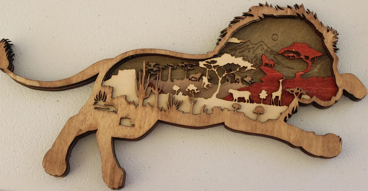 A wooden horse with a picture of animals on it.