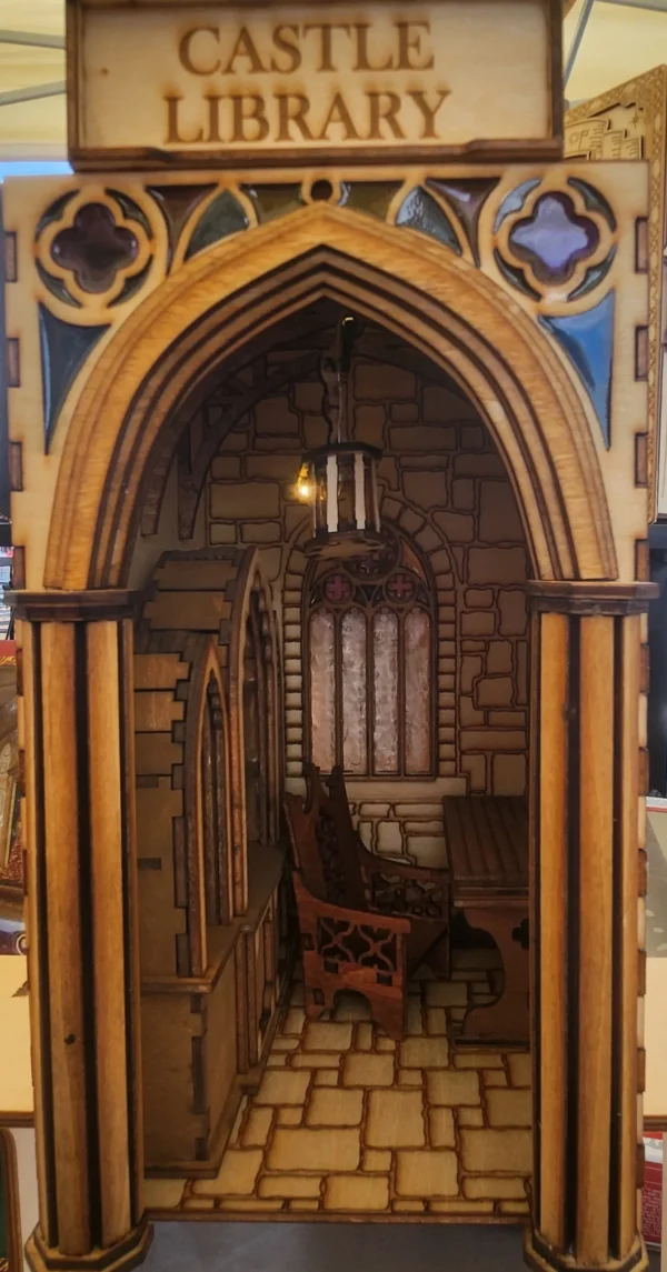 A wooden archway with a window and chair in it.