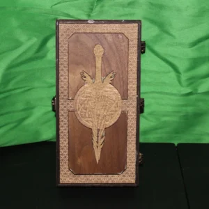 A wooden box with a sword on it